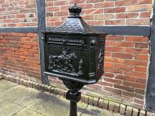 Beautiful standing heavy black cast iron mailbox, rock solid!!