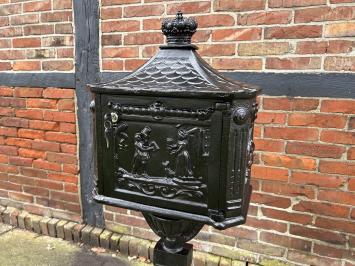 Beautiful standing heavy black cast iron mailbox, rock solid!!